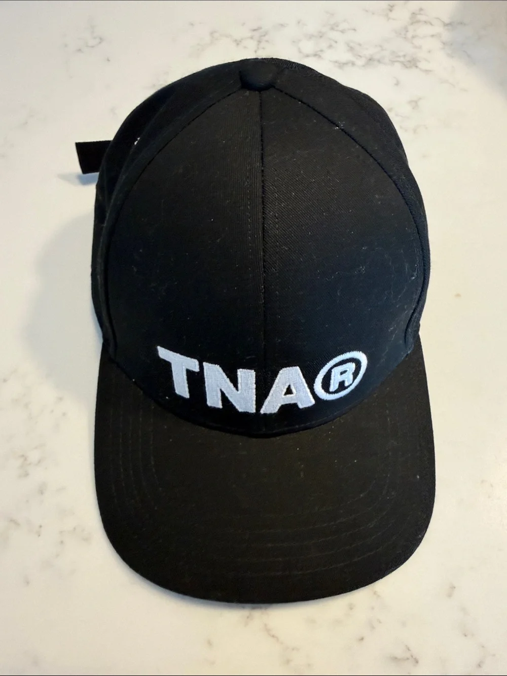 TNA Black Baseball Cap with White Embroidered Logo - Never Worn